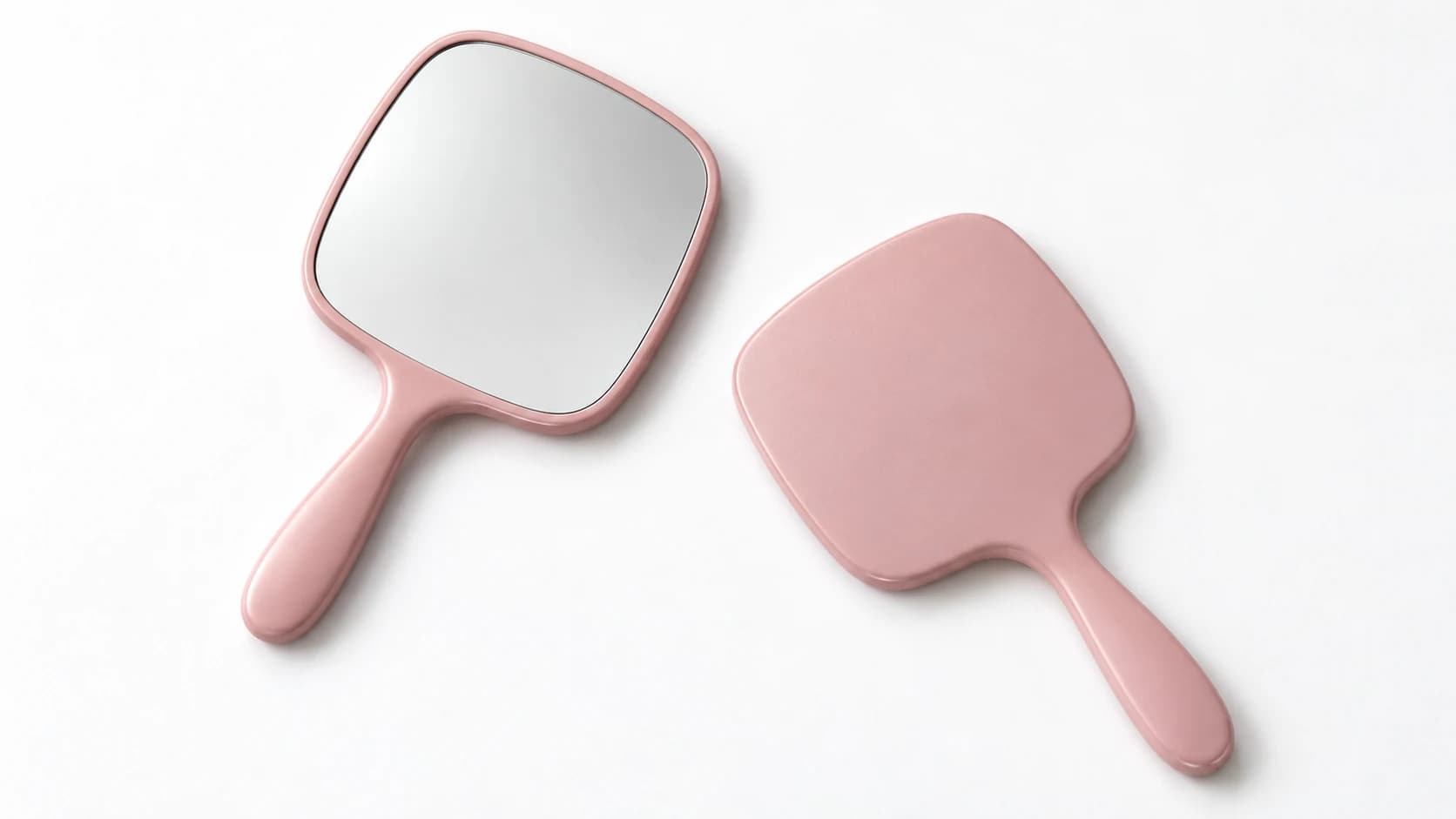 Pink handheld makeup mirrors shown from the front and back on a white background