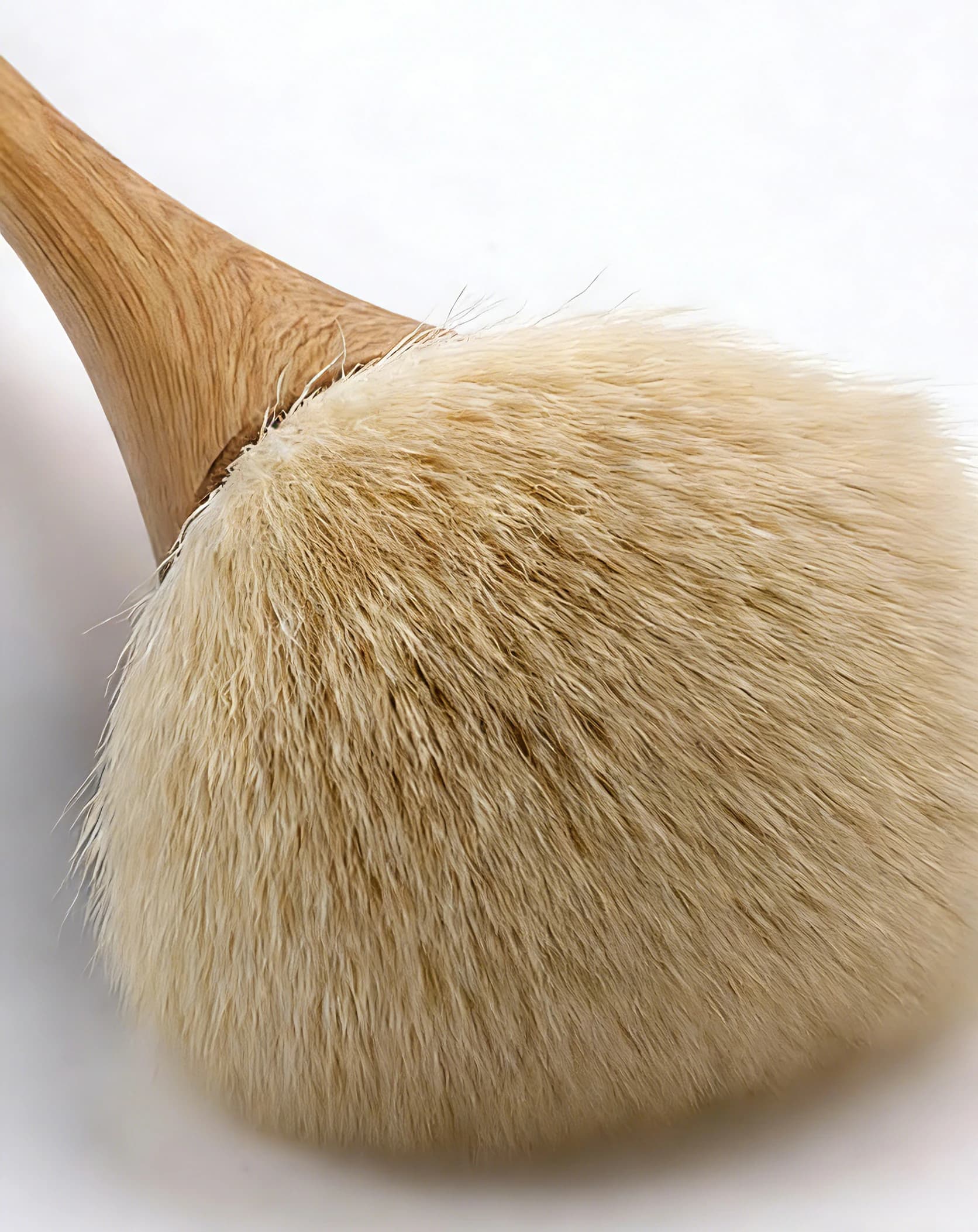 Brown vegan synthetic bristles on rounded powder brush