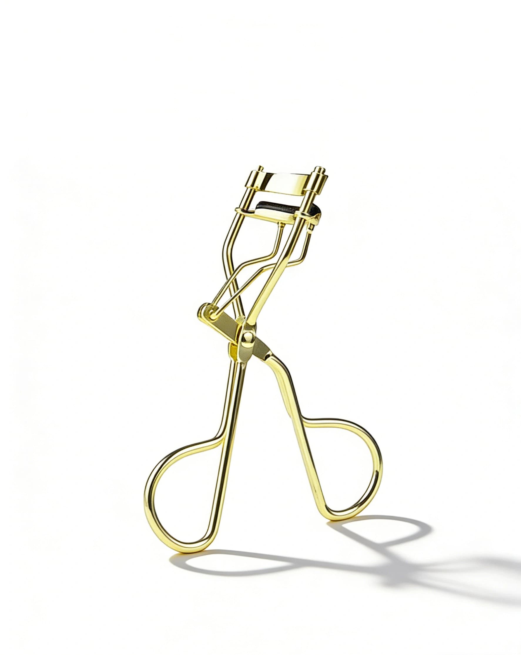 Classic yellow gold full-width metal eyelash curler