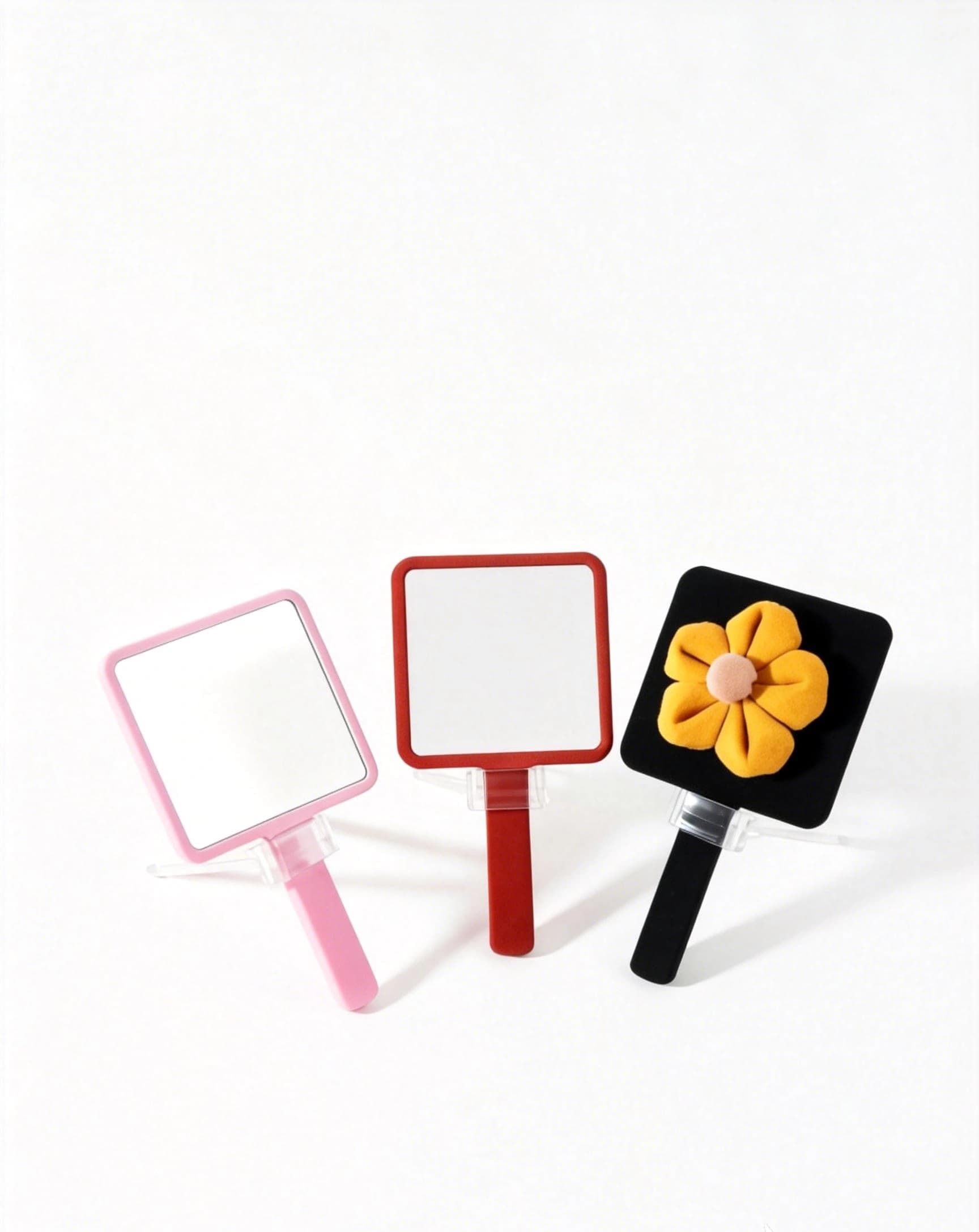 Fabric-covered cosmetic mirror back with raised 3D fabric flower
