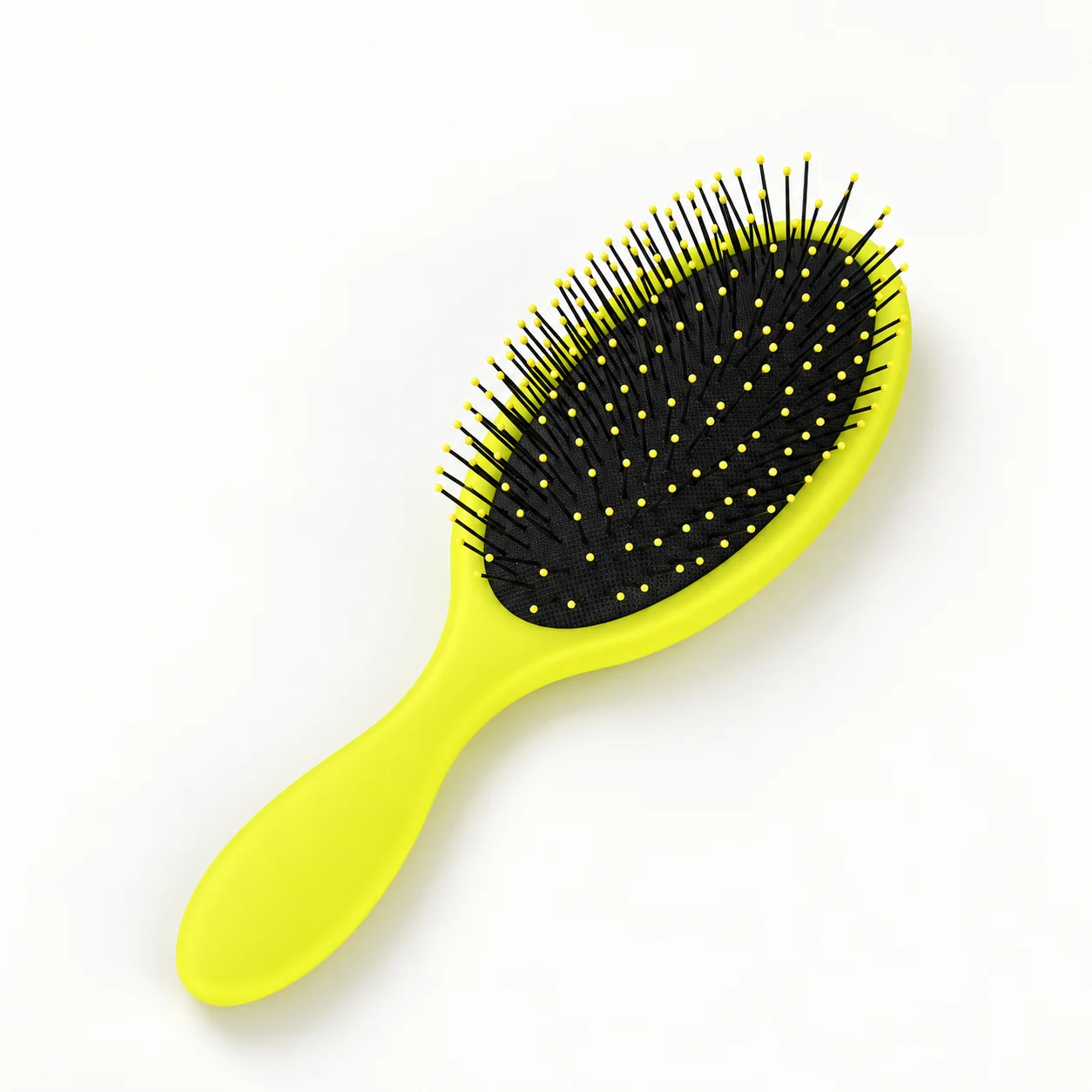 Yellow BLC-04 oval cushion brush with rounded nylon pin tips
