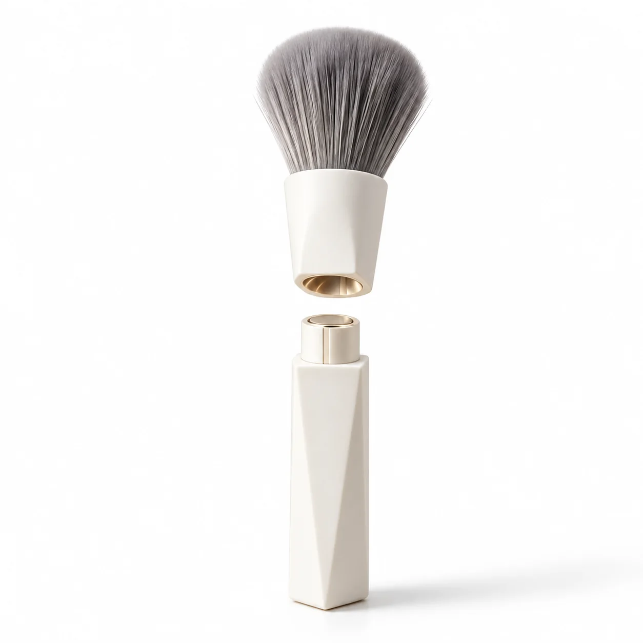 Detached grey-bristle brush head above an ivory handle, showing the magnetic attachment
